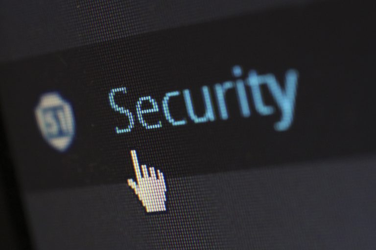 Secure digital security concept with a cursor clicking on the word "Security" on a screen.