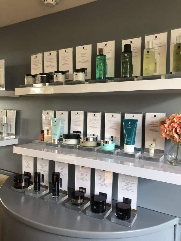 Skincare products on display at Suffolk Business store in Suffolk, UK.