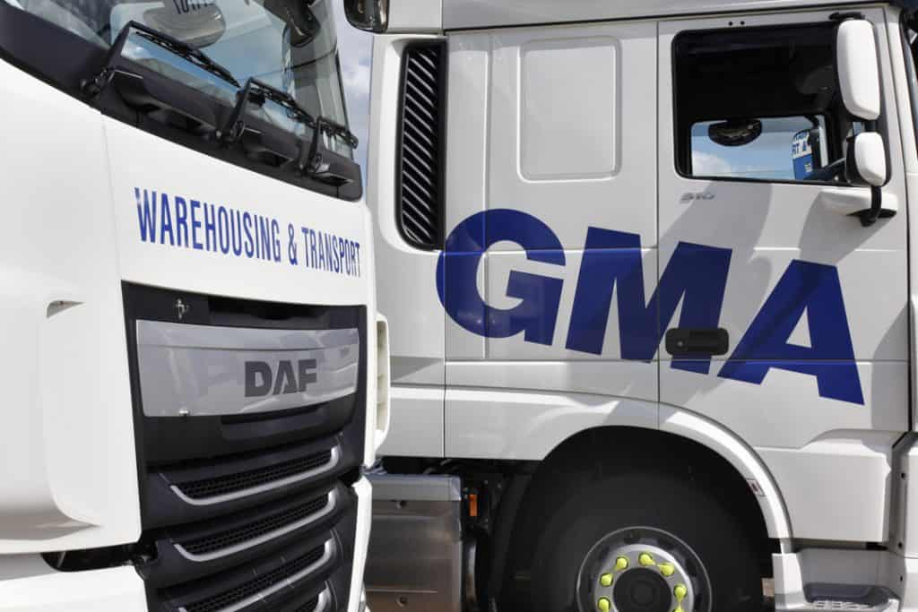Suffolk warehouse and transport trucks for logistics and freight services.