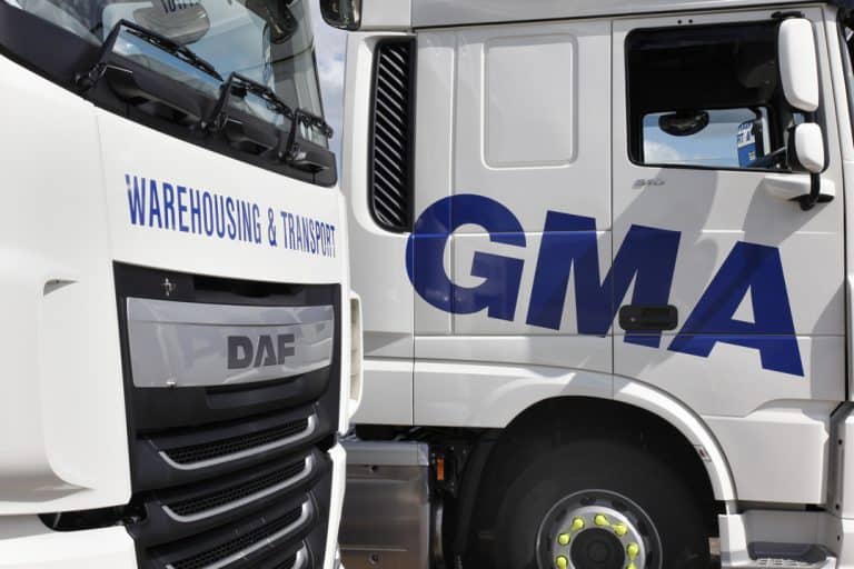Suffolk warehouse and transport trucks for logistics and freight services.