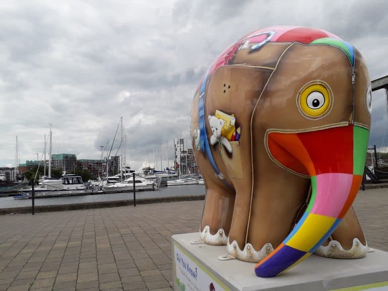 Unique Suffolk Business-themed elephant sculpture by the waterfront.