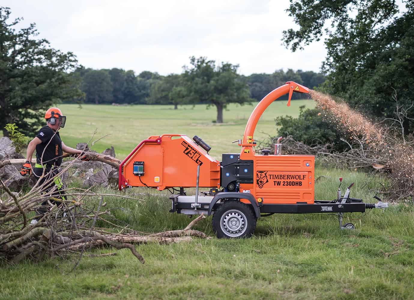 Tree branch chipping with timberwolf wood chipper in Suffolk.