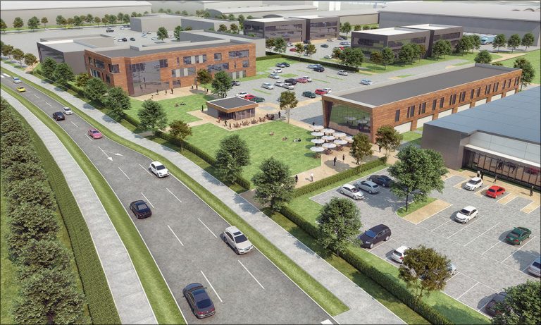 Business park with office buildings, parking, and green spaces in Suffolk, UK.