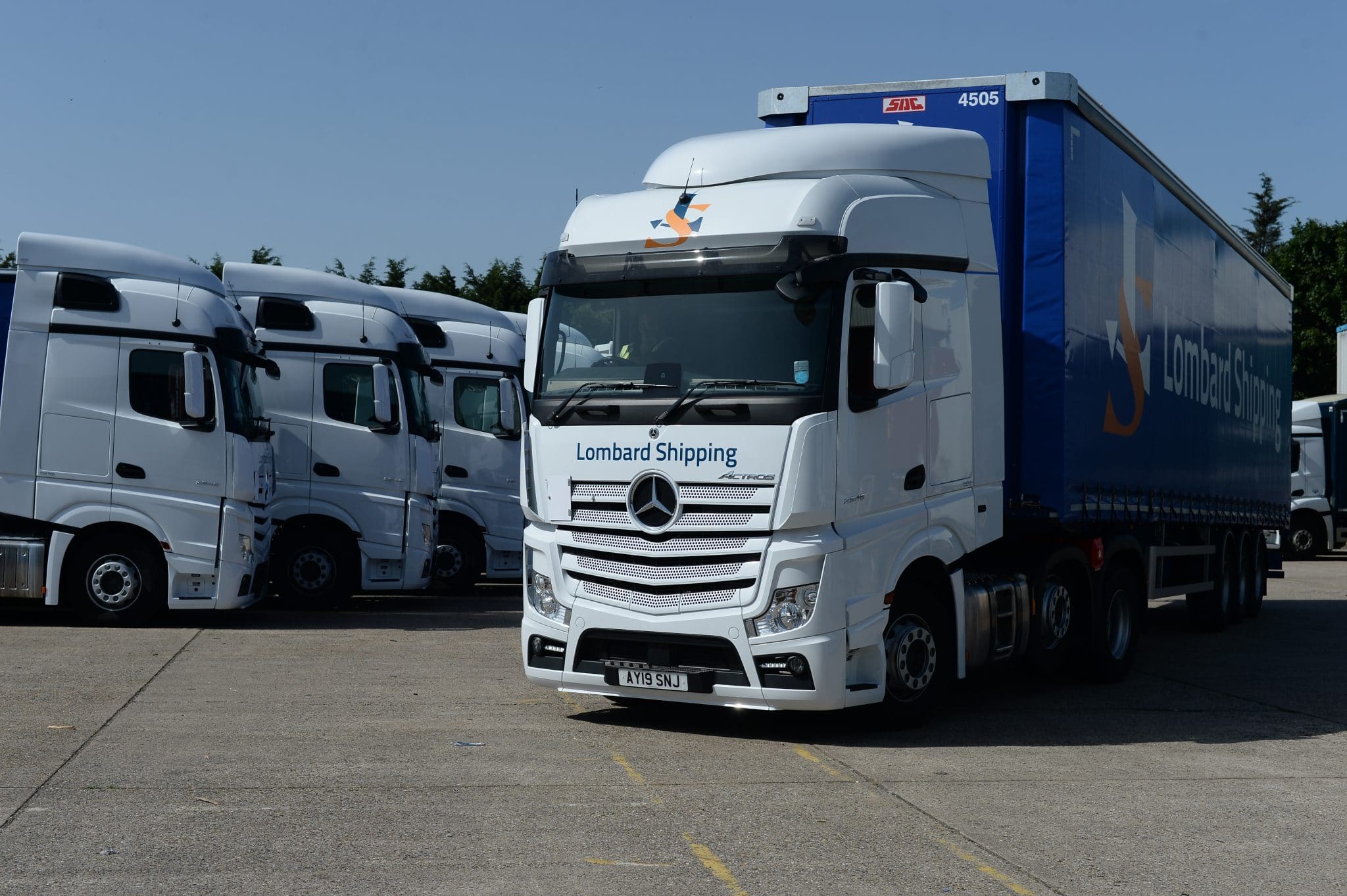 Modern Mercedes freight truck at a logistics yard in Suffolk, UK.