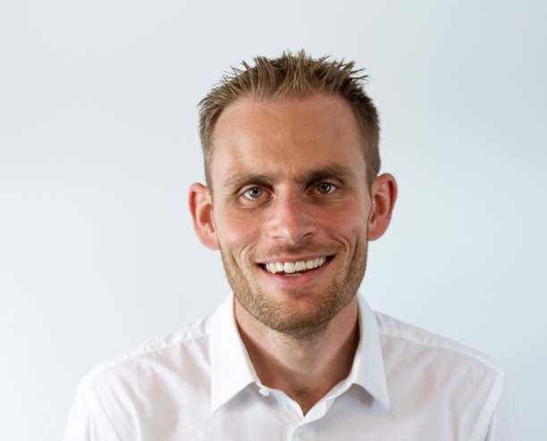 Business professional smiling portrait for Suffolk Business.