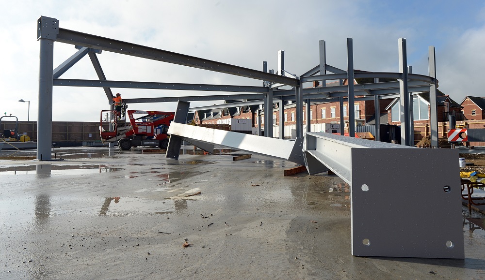 Steel framework construction site in Suffolk for new commercial building.