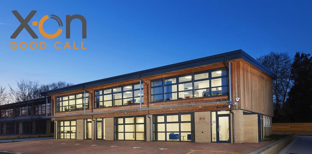 Suffolk Business Centre featuring contemporary glass architecture and wooden exterior, ideal for loc.