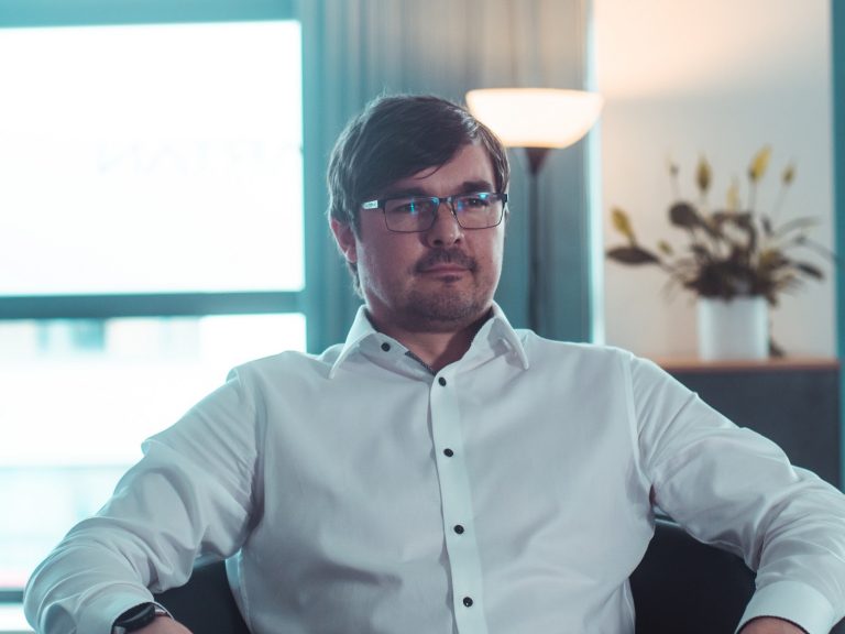 Business professional working in Suffolk office environment.