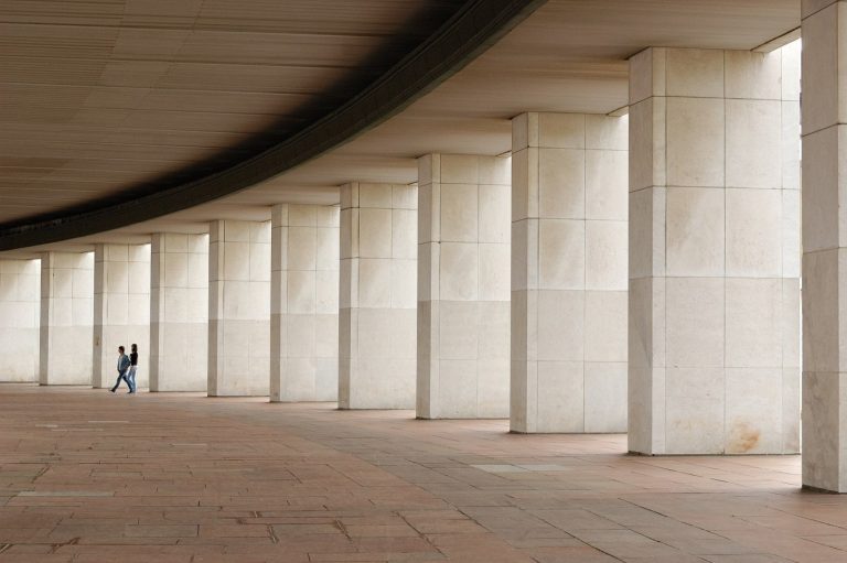 Modern Suffolk business centre with large columns and open walkway.