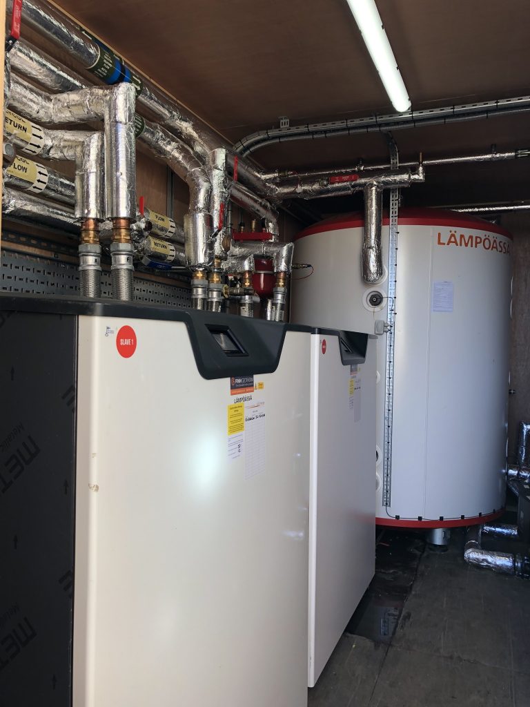 Commercial heating and plumbing system with boilers and pipes in Suffolk business premises.